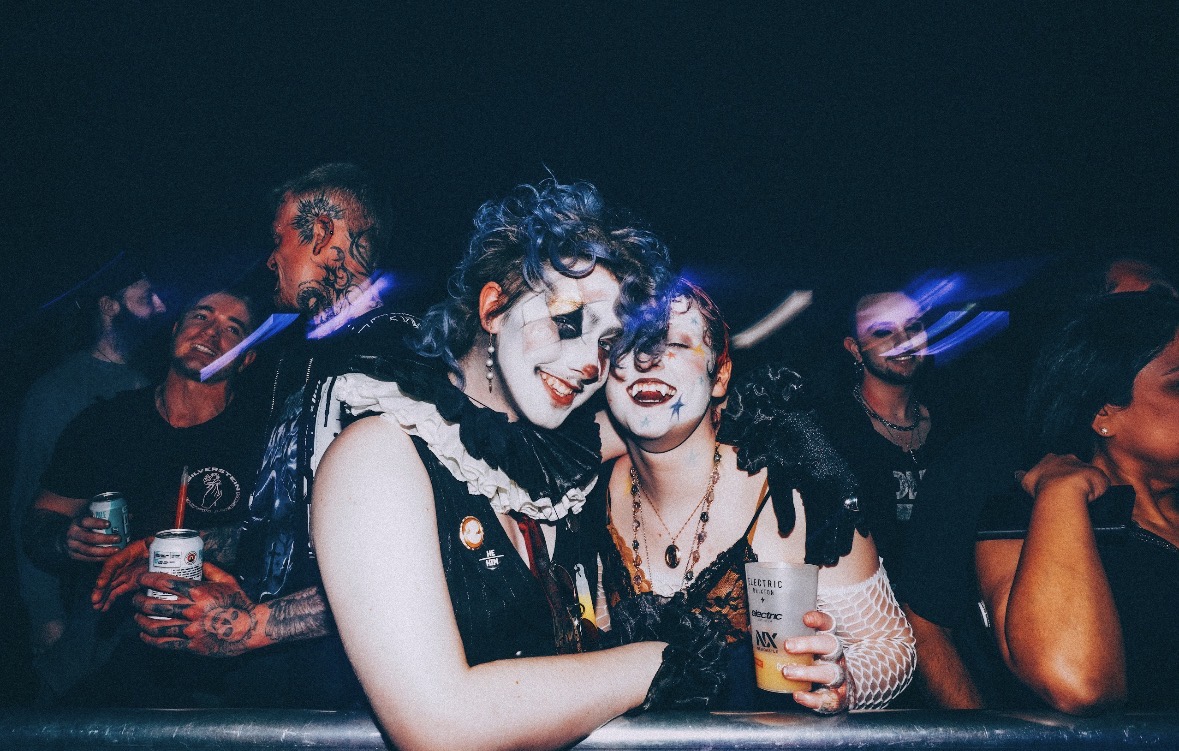 Fans cheering at the front row of the Brixton show